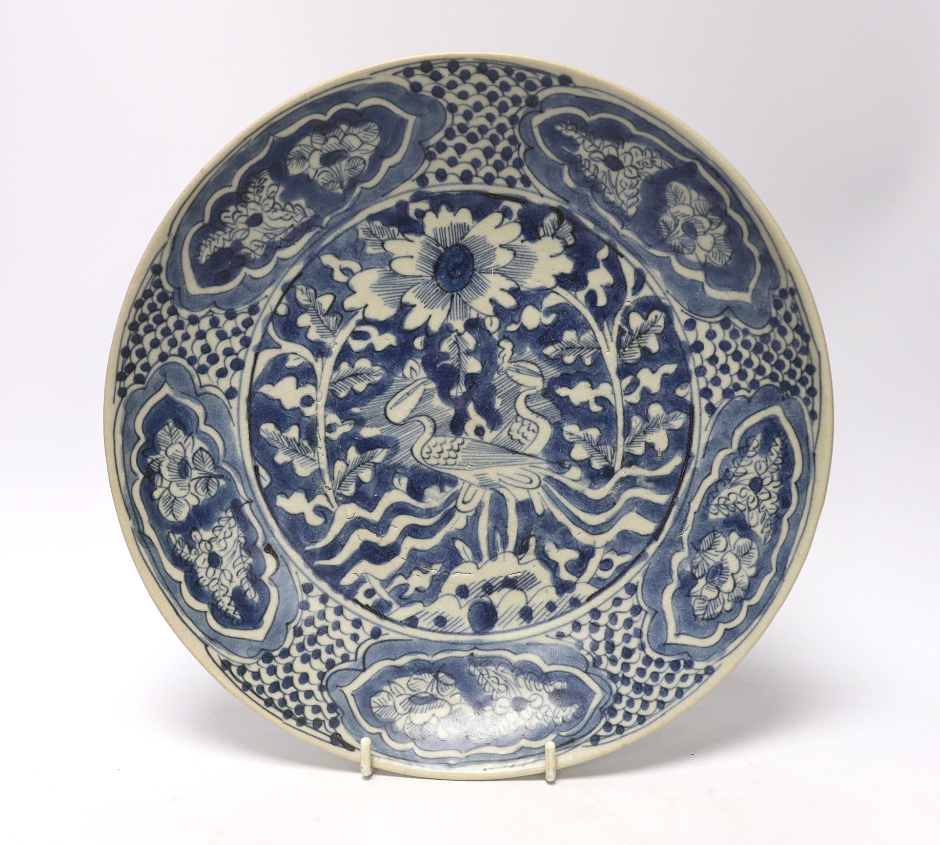 A Chinese Swatow blue and white phoenix dish, Binh Thuan shipwreck, early 17th century, 27.5cm